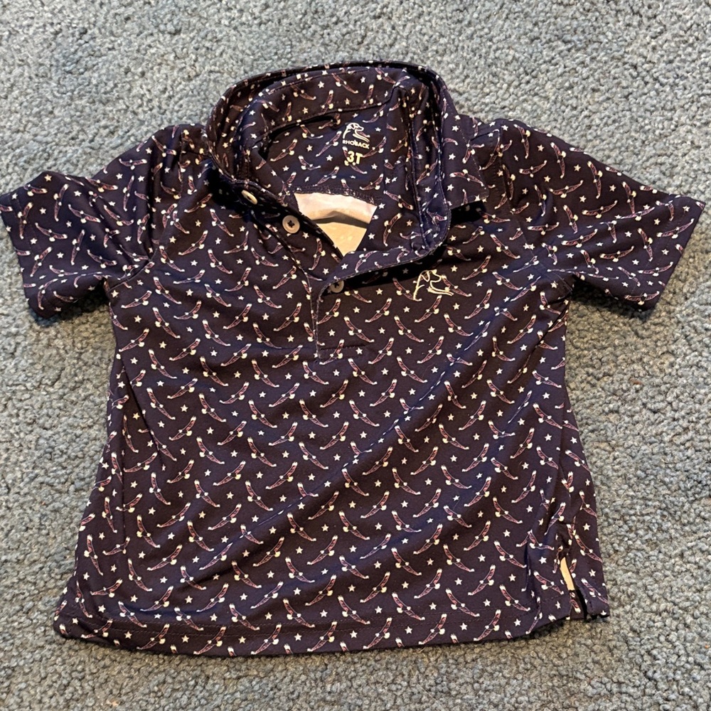 Rhoback Navy Polo with White and Red Sail Pattern